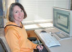 Janee at her RV computer