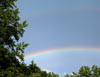 outside our house in July '03. This double rainbow stretched across the whole sky!