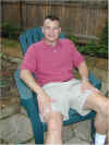 Our friend Scott, resting outside his house 6/19/00