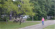 Janee walking back from taking the trash to the dumpster at Monson MA. 6/29/00