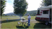 Michael cooking BBQ chicken in Ferenbaugh, NY