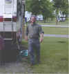 Michael getting his hoses set up in our camp at St. Phillipe, just south of Montreal, 7/08/00