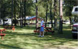 Michael relaxing with a Molson at our campsite in Mercer PA