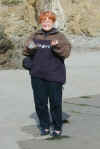 Becky holding rocks she packed back.