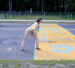 Janee at the site of the annual start of the Boston Marathon at Hopkinton, MA