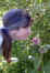 Janee stopping to smell the milkweed.