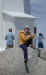 Janee in front of the lighthouse at Peggy's Cove