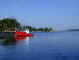 We asked the man in this boat about conditions of a passage in the cove.